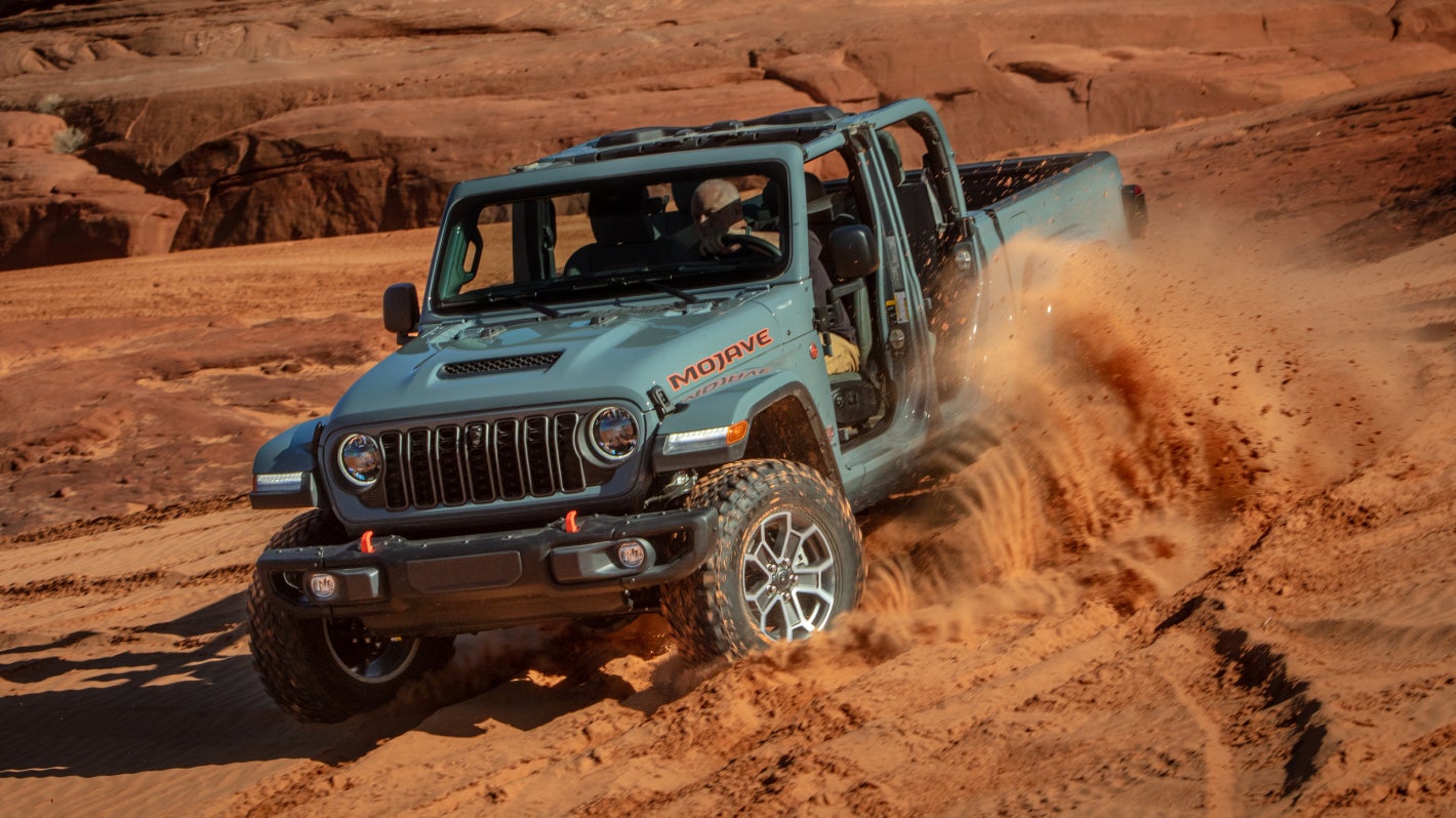 2026 Blue Jeep Gladiator Mojave Off-Roading and Kicking up Dirt